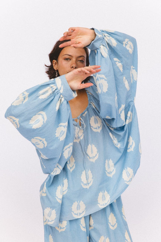 Ria Blouse Sky — studio full length front view, model wearing sky blue hand block print cotton blouse, relaxed fit with tie details, artisan Jaipur India | Daughters of India