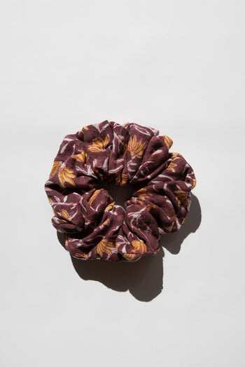 Daughters of India Upcycled Scrunchie in Sumac, a deep burgundy-purple hair scrunchie made from upcycled cotton fabric